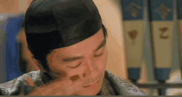 周星驰gif九品芝麻官gif搞笑gif包龙星gif假哭gif经典电影gif