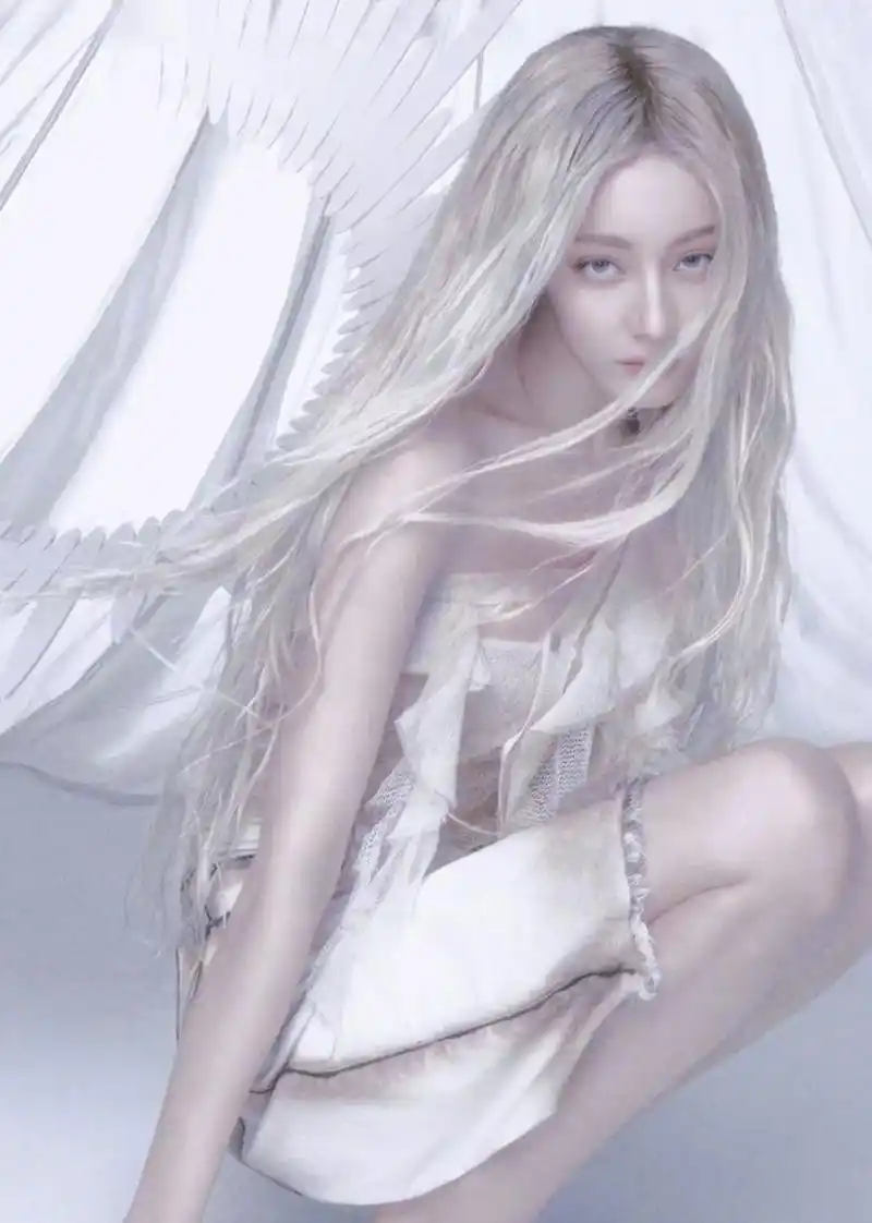 迪丽热巴登上《时装lofficiel》三月开季刊封面,白色婚纱大片美翻天.