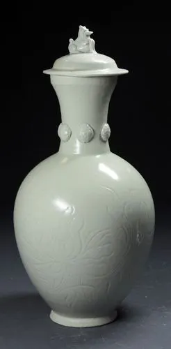 北宋定窑白釉兽钮盖瓶