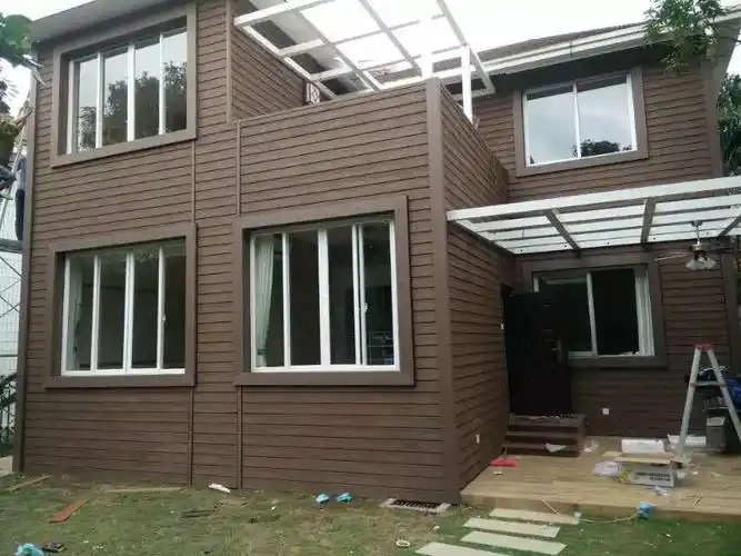 塑木外墙轻钢别墅外墙挂板集装箱快装墙板隔热木塑型材定制