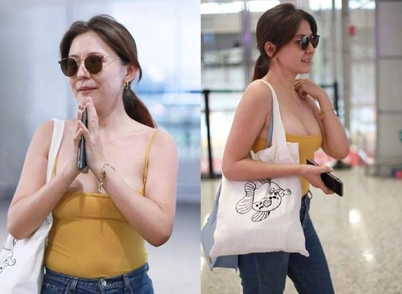 热依扎现身机场,吊带装惹网友争议,颜值不及以前脸胖一圈