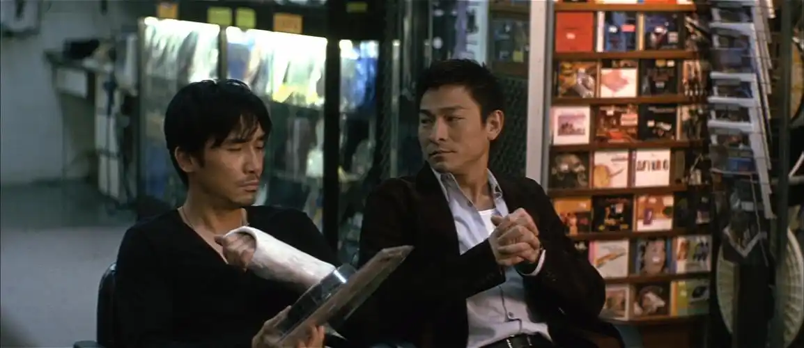 与刘建明的结局相比,陈永仁的结局才是善终,深度解析《无间道》