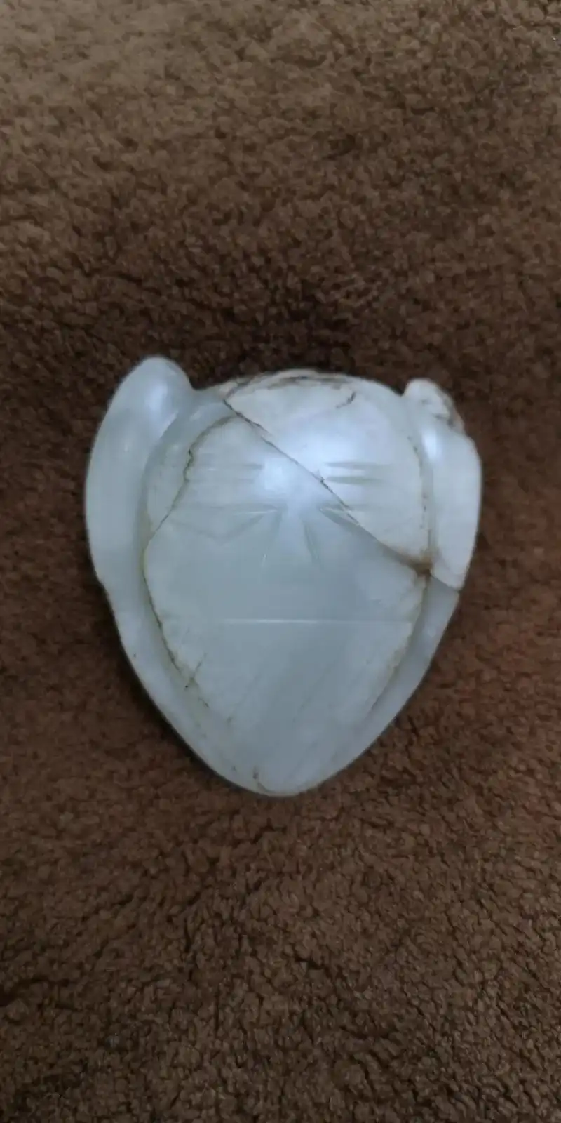 超越时空的对话隔61红山玉神人面欣赏相隔6000年今日的相逢愈发显得