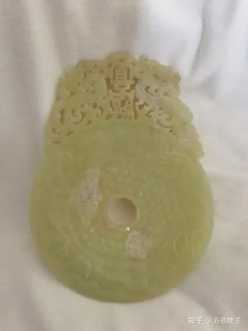 汉代羊脂白玉宜子孙出廓双凤佩璧