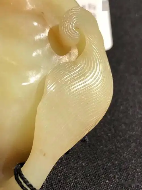 2020纽约苏富比古玉拍卖成交价1160万黄玉雕瑞兽500万玉马首