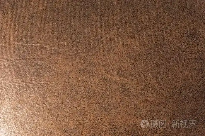 纹理背景表面的纺织内饰家具特写.皮革棕色面料结构照片-正版商用图片