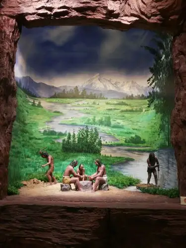 这幅图是原始人生活画面.