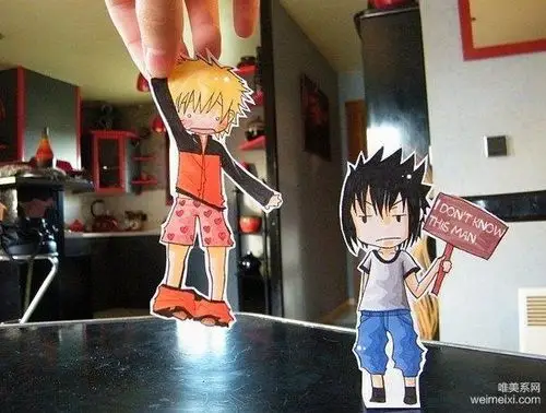 卡通纸片人与人手的趣味创意互动图片