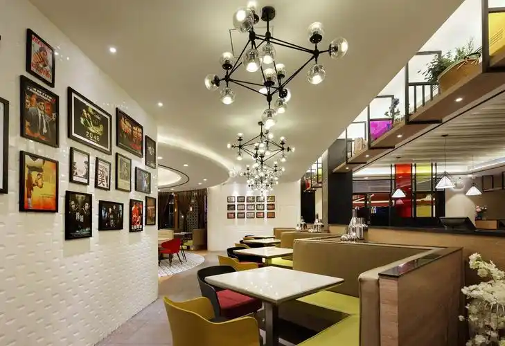 广州茶餐厅店面照片墙装修设计图片_装信通网效果图