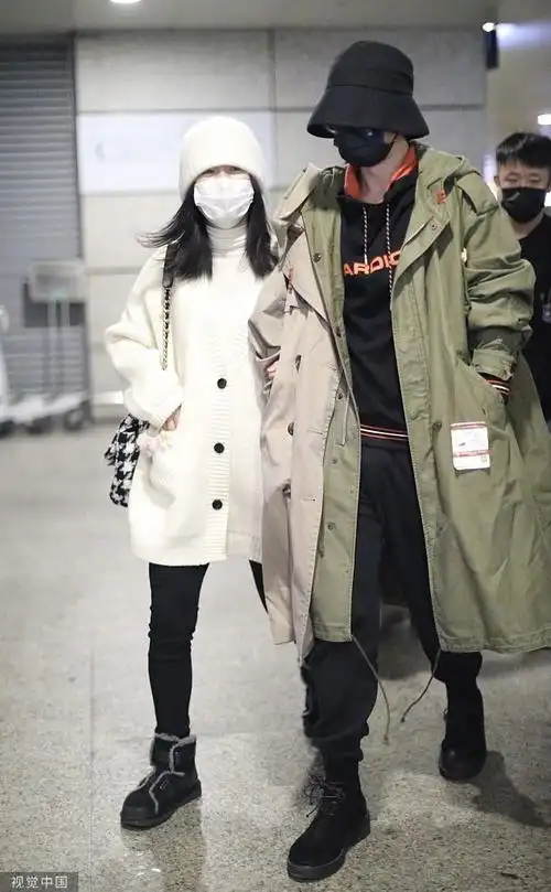 谢娜挽张杰现身机场##张杰谢娜合体现身机场