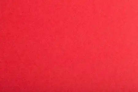 红色纸张纹理或背景. 空白的红色页面.照片