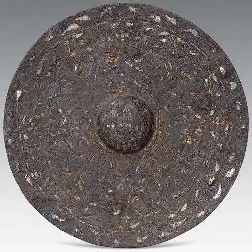 4255晋错金银凤鸟铁镜