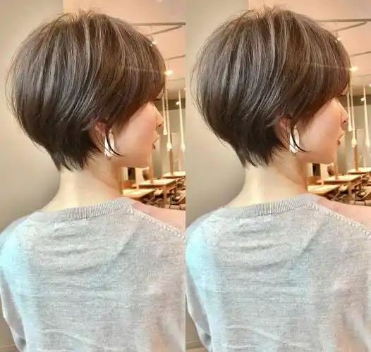 侧面半盖耳的效果,若隐若现的露出耳朵柔美自然,弱化了短发带给人过于
