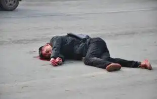 高清:长沙街头发生枪案 枪手被砖头砸倒(图)