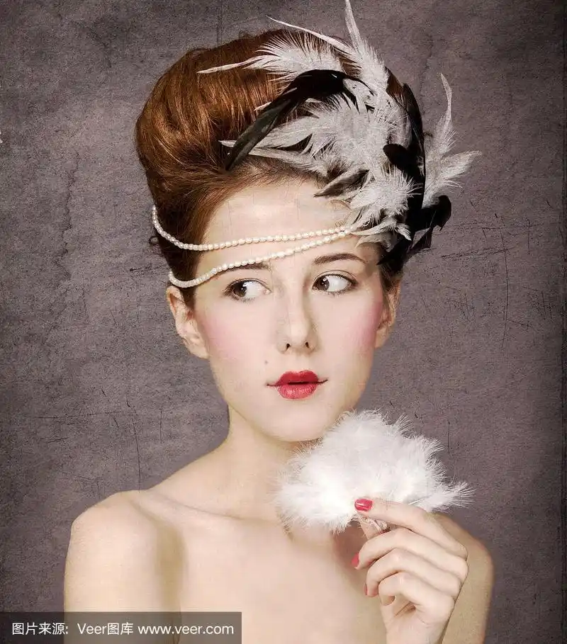 有着复古背景的洛可可式发型的女孩.