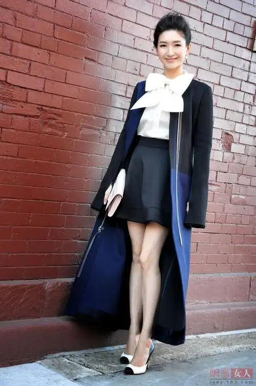 江疏影亮相时装周 大蝴蝶结配短裙显公主范