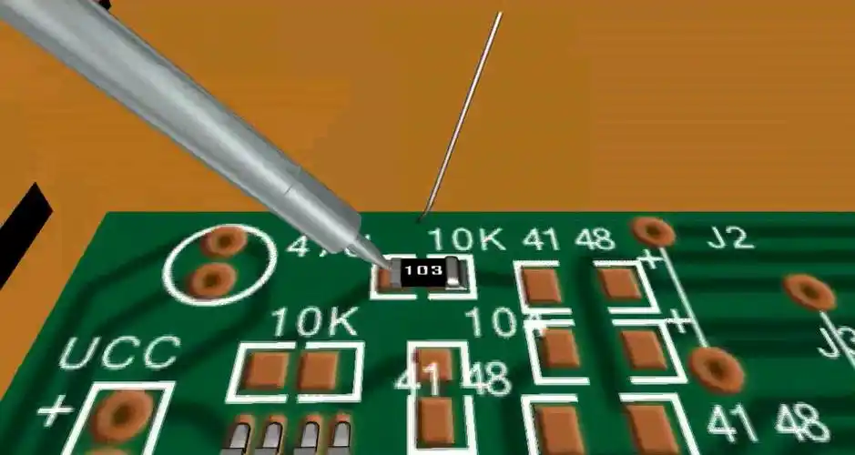 再用镊子夹取贴片电阻,电容,二极管放置在焊点上