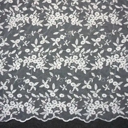 欧根纱绣花时尚女装蕾丝面料镂空绣花全涤玻璃纱绣花面料现货
