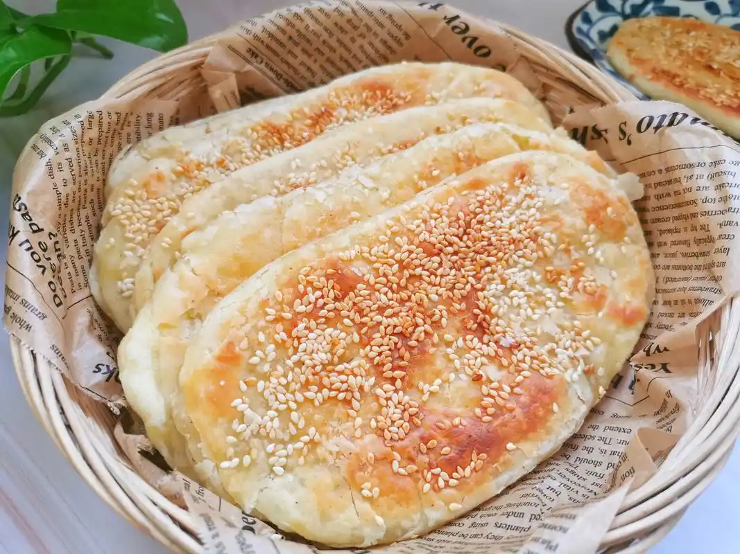 早餐迷上这烧饼,酥得掉渣儿,分享配方和做法,再也不用排队买了_快新闻