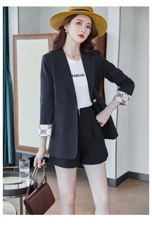 女式中长款休闲宽松黄色西服外套上衣2021秋装新款九分袖小西装女