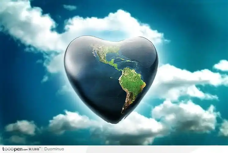 蓝天白云下心形的地球生活百科图片素材