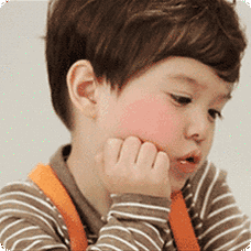 小男孩,托脸,扭头的表情包