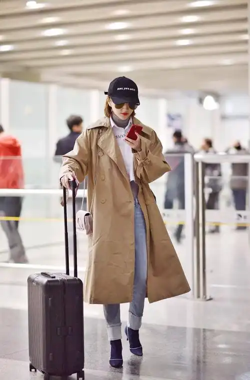 别再露脚踝,温暖的袜靴女明星都在穿!