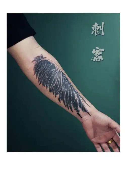 翅膀遮盖纹身图片手臂纹身图案