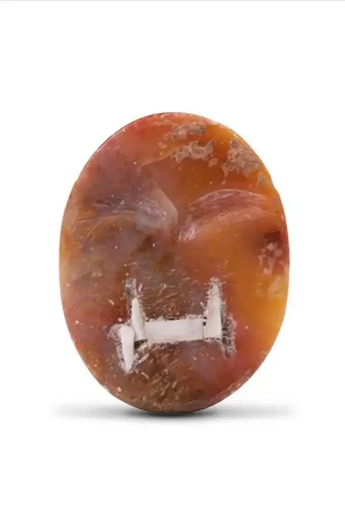 兴隆洼文化人面形玉饰