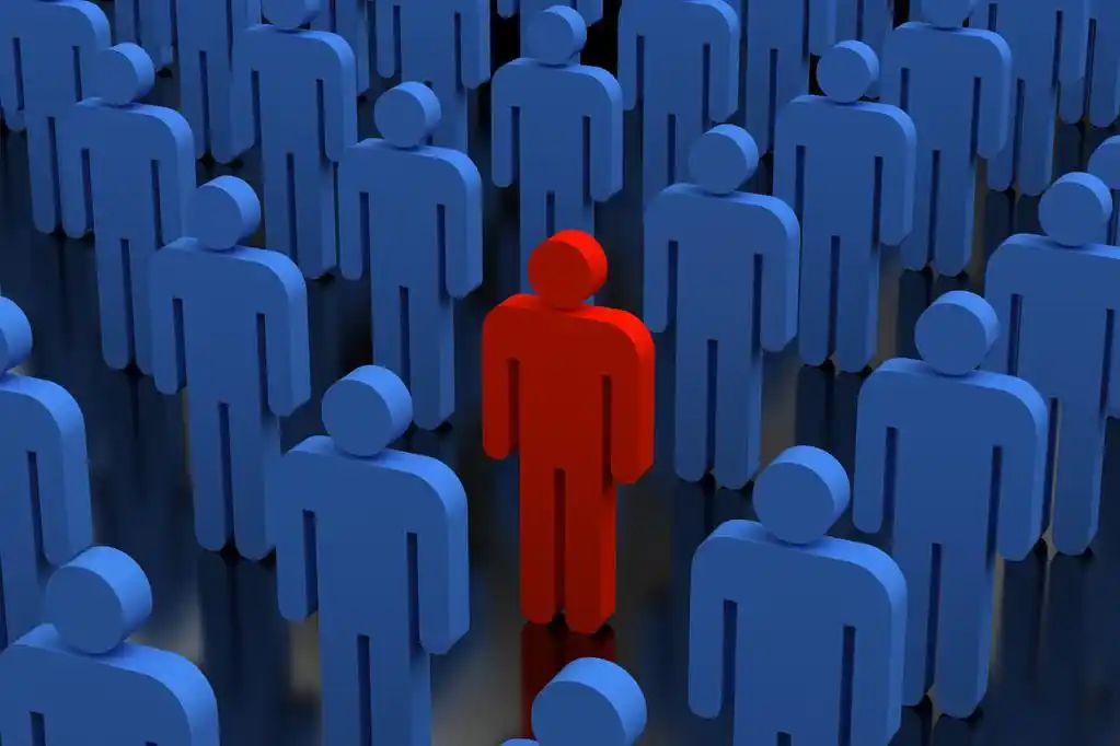 独特的人在人群中,举例说明了一个红色的人,在一群蓝色的人