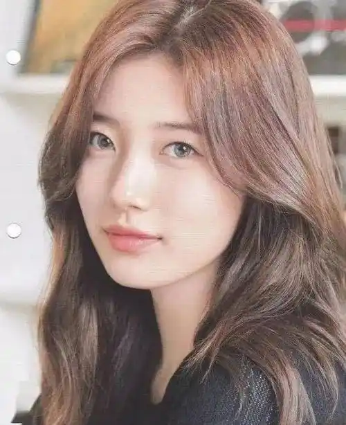 而且s型八字刘海的第二个弧度落在颧骨下方修饰脸型效果最理想.