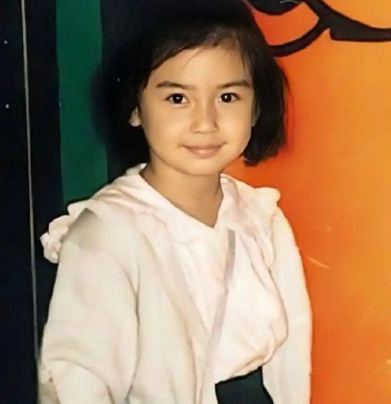 考古angelababy小时候,图一的雨衣小baby也太可爱了