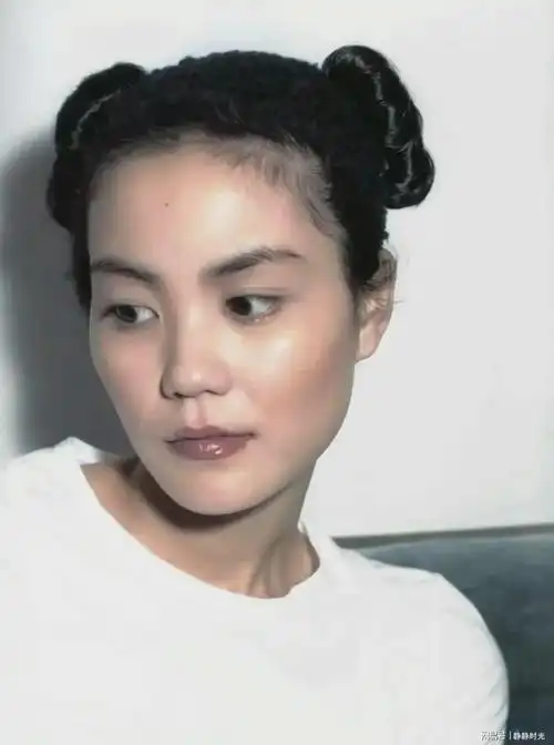 1997年28岁的王菲整了个哪吒头造型