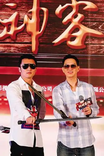 谢霆锋与张家辉(右)都是"奶爸"