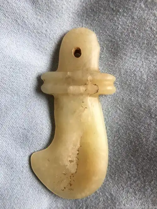 夏家店文化赵宝沟文化勾云佩勾子靴形器_岫岩玉_第1张_7788玉器收藏