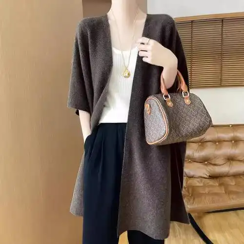 大气高级感纯羊毛大披肩针织斗篷秋冬新款外搭中长款无袖开衫坎肩