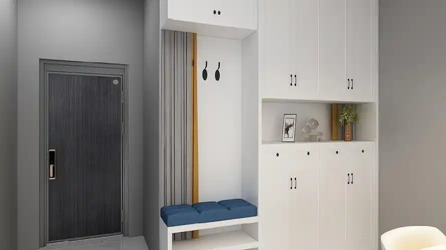 入户门转角处做了一个鞋柜,旁边设计了一个做柜翻遍进出换鞋.