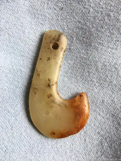 夏家店文化赵宝沟文化勾云佩勾子靴形器_岫岩玉_第2张_7788玉器收藏