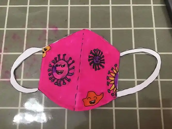 江小二年级手工《我为自己设计花口罩》