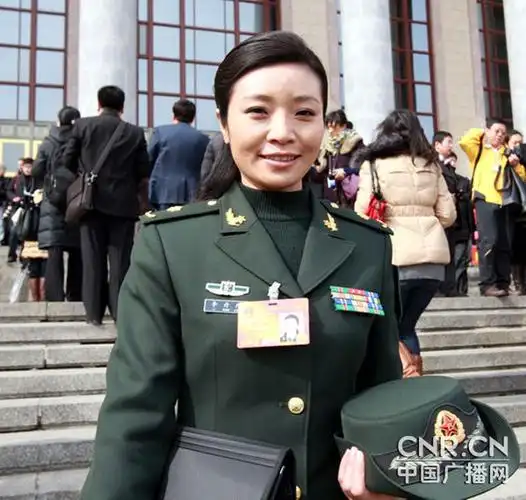 全国人大代表,第二炮兵文工团歌唱演员李丹阳