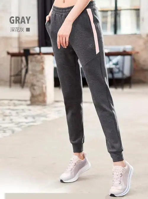 特步运动长裤女新款户外休闲跑步舒适透气女款针织运动裤 黑粉红 2xl