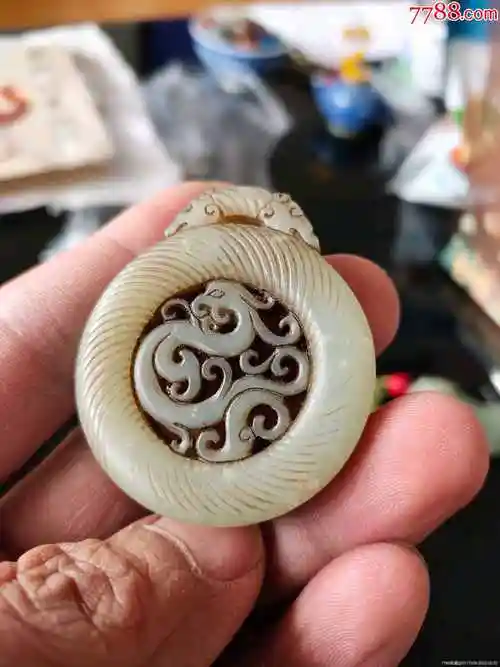 高古玉螭龙螭凤玉佩_和田玉_图片鉴别_收藏价值_7788和田玉收藏