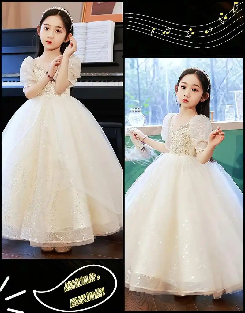 少不了～这款礼服裙采用可爱的泡泡袖及简约大方的圆领,蓬蓬裙摆设计