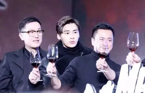 向上影业创始人,ceo肖飞与演员李易峰,华谊兄弟总裁王中磊