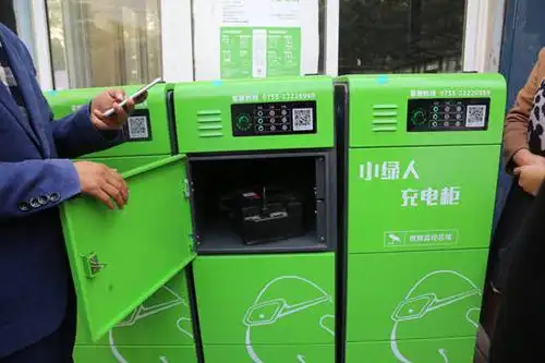 首批小绿人充电柜落地亚运村 破解电动自行车充电难题_手机搜狐网