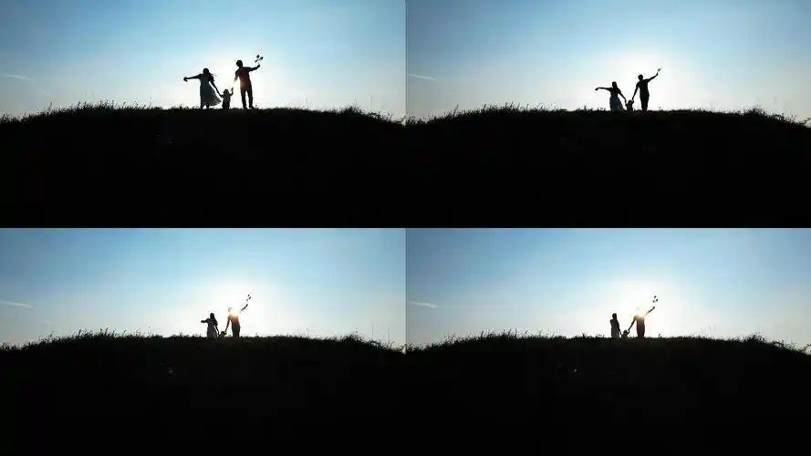 一家三口夕阳西下幸福的剪影一家人幸福剪影