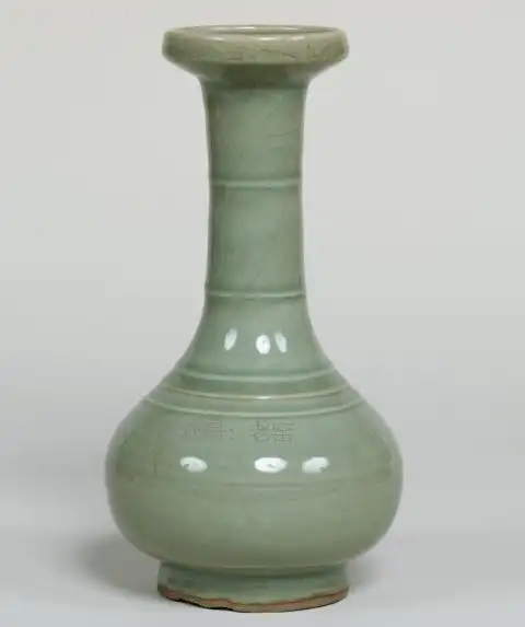 褐釉模印人物长颈旋纹瓶 美国大都会博物馆藏雍正款仿汝釉弦纹菊瓣瓶