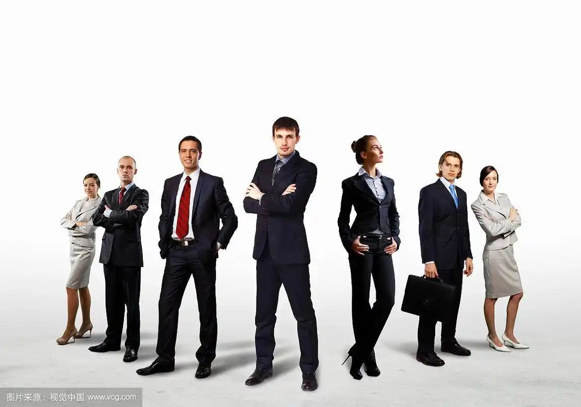 商务人士集体摆姿势的图片.团队合作理念