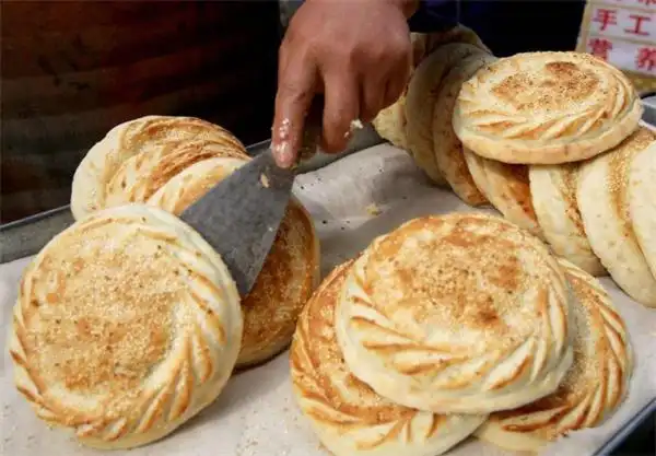 打烧饼能赚多少钱打烧饼加盟有市场吗