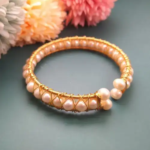 天然珍珠手镯女轻奢侈设计金色绕线开口手环可调节复古手链